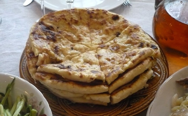 „”